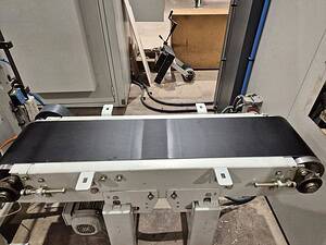 Conveyor belt in manufacturing facility for industrial applications.