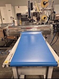 Conveyor belt manufacturing machinery at Premier Belting Services. Custom belts produced for industr.