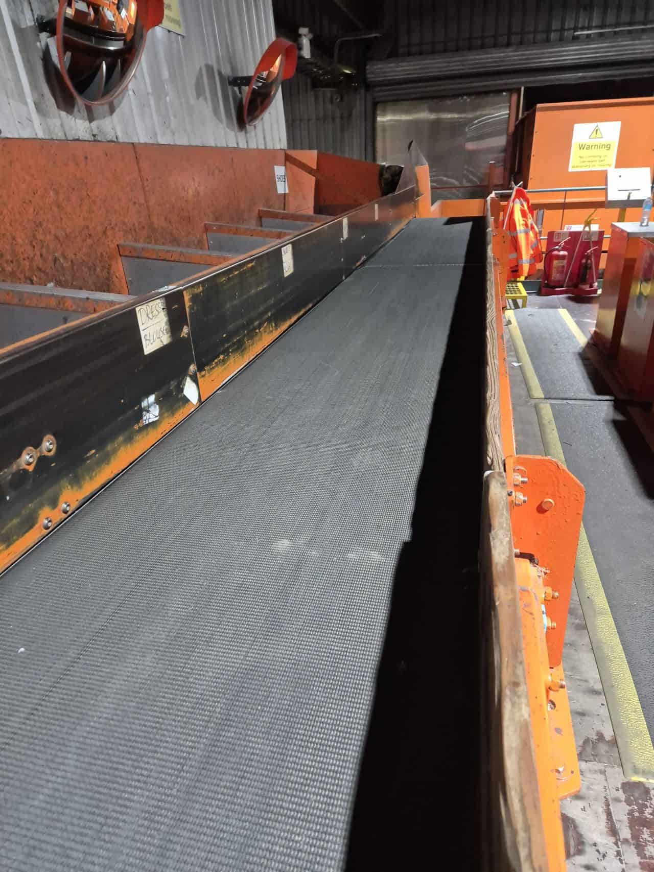 Conveyor belt designed for industrial applications in various industries. Durable and reliable for m.