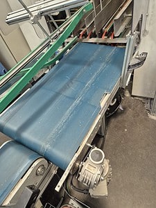 Industrial conveyor belt for manufacturing and processing applications.