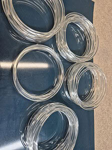 Poly bands, ideal for securing and bundling items in various industries.