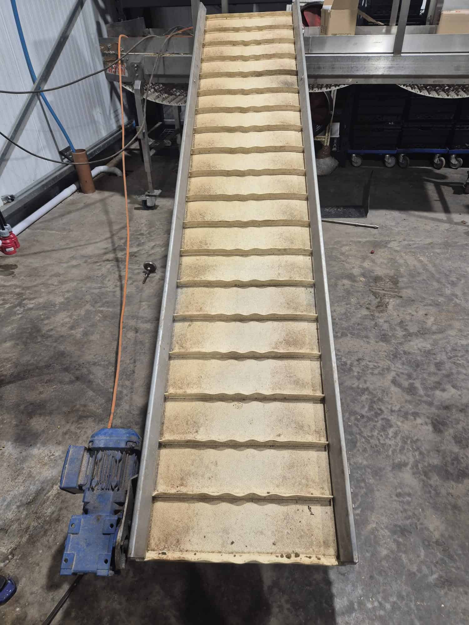 Conveyor belt system used in manufacturing and logistics industries for efficient material transport.